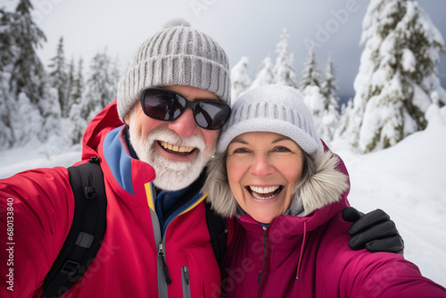 Elderly couple embracing the joy of an active winter getaway in a picturesque snowy landscape, National Grandparents Day, International Day of Older Persons