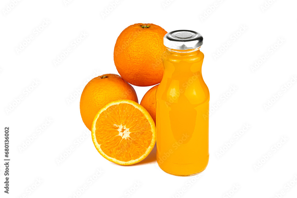 A bottle full of orange juice with a group of orange A bottle full of orange juice with a group of orange
