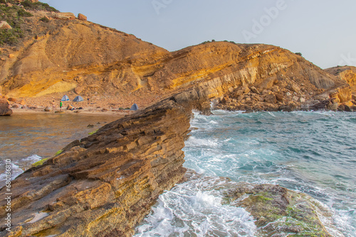 Deserted Haven: Ain Kanassira's Beach Nestled Between Sea and Mountains in Tunisia