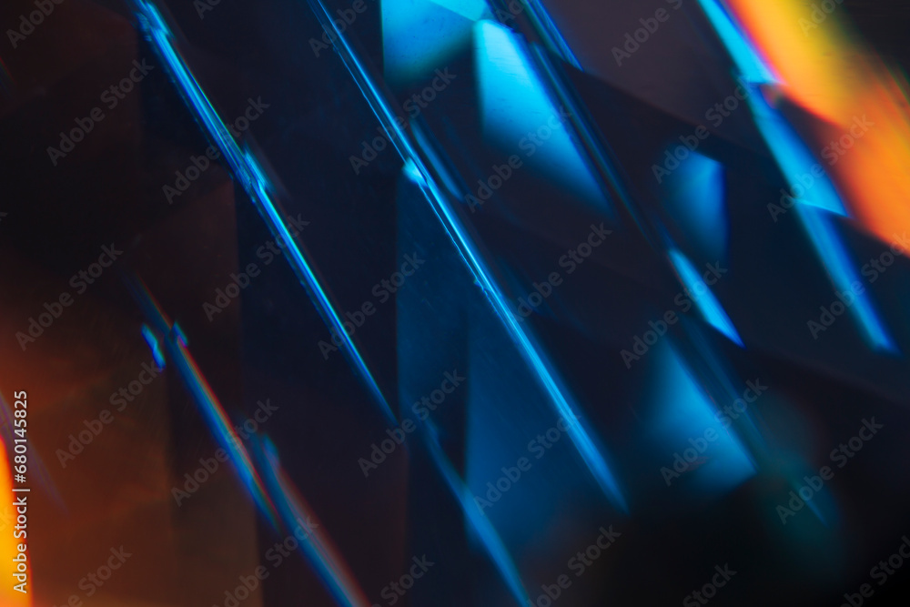 Light leak overlay coloured in orange and blue hues. Background is ...
