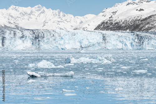 Growlers (small Icebergs) floating on the sea in front of Harvard Tidewater Glacier at the end of College Fjord, Alaska, USA