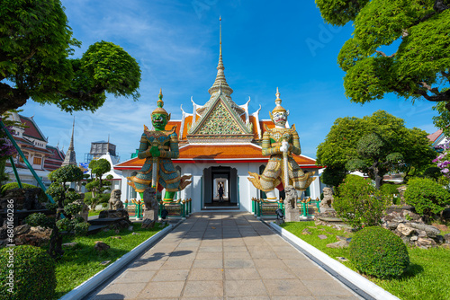 Gates to Ordination Hall with statues of Giants, demon guardians at Wat Arun © themorningglory
