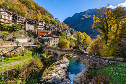 The beautiful village of Pontboset in the Champorcher Valley during fall season. Aosta Valley, northern Italy. photo