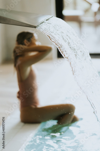 Young woman relaxing by the...