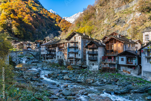 The beautiful village of Rassa, during fall season, in Valsesia (Sesia Valley). Province of Vercelli, Piedmont, Italy. photo