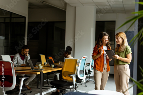 Two young business women wi...