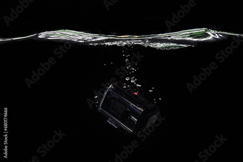 camera falling into a glass