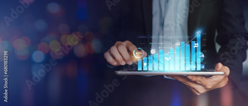 Businessman with digital finance business fund data graphic of financial technology investment strategy for growth success decision. Digit economy fintech result analytics banner background.