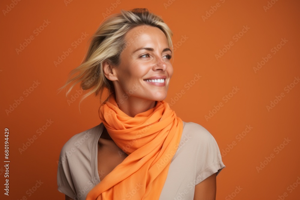 Portrait of a blissful woman in her 40s wearing a versatile buff against a soft orange background. AI Generation Portrait of a blissful woman in her 40s wearing a versatile buff against a soft orange background. AI Generation