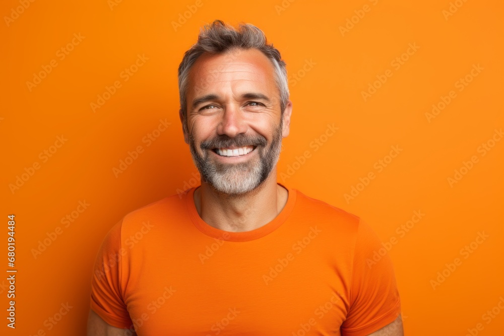 Portrait of a smiling man in his 40s donning a trendy cropped top against a soft orange background. AI Generation Portrait of a smiling man in his 40s donning a trendy cropped top against a soft orange background. AI Generation