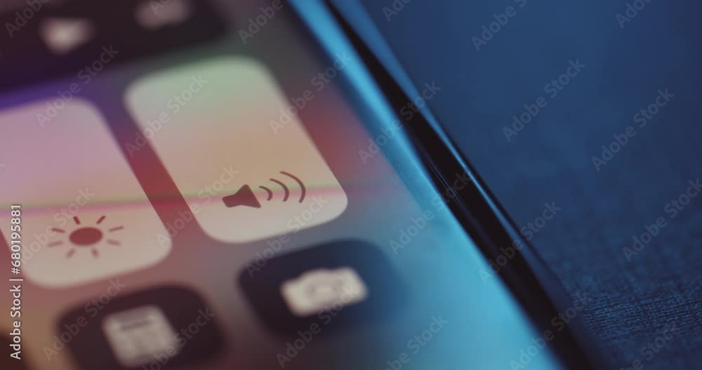 Adjusting volume on device screen - close up Adjusting volume on device screen - close up