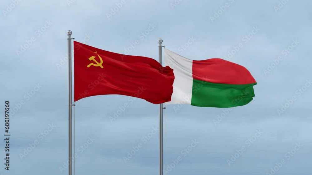 Madagascar flag and Soviet Union or USSR flag waving together on cloudy sky, endless seamless loop, two country relations concept Madagascar flag and Soviet Union or USSR flag waving together on cloudy sky, endless seamless loop, two country relations concept