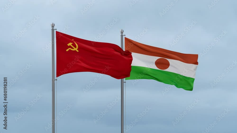 Niger flag and Soviet Union or USSR flag waving together on cloudy sky, endless seamless loop, two country relations concept Niger flag and Soviet Union or USSR flag waving together on cloudy sky, endless seamless loop, two country relations concept