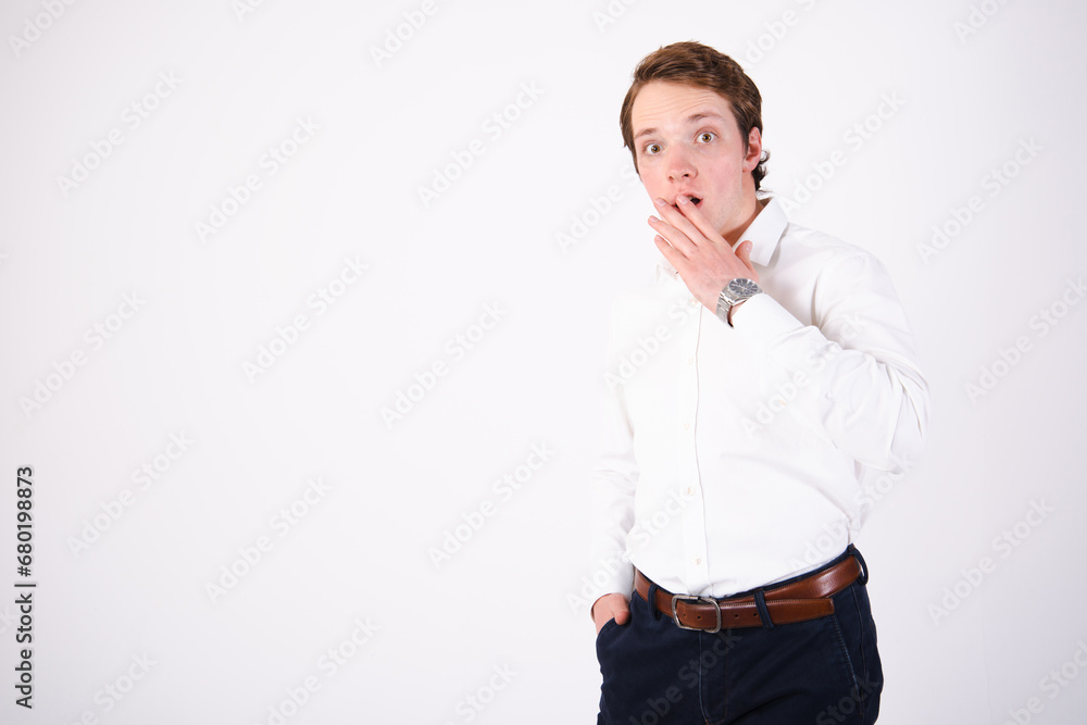 Young attractive man posing in the studio. Young attractive man posing in the studio.
