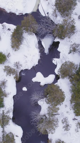 Aerial view winter frozen river in the mountains (ID: 680200464)