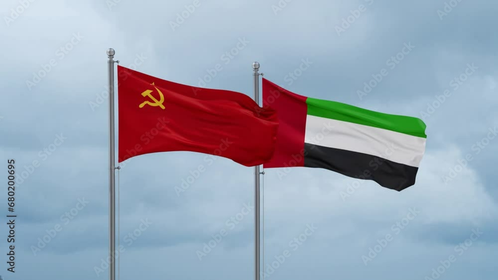 United Arab Emirates and Soviet Union or USSR flag waving together on cloudy sky, endless seamless loop, two country cooperation concept United Arab Emirates and Soviet Union or USSR flag waving together on cloudy sky, endless seamless loop, two country cooperation concept