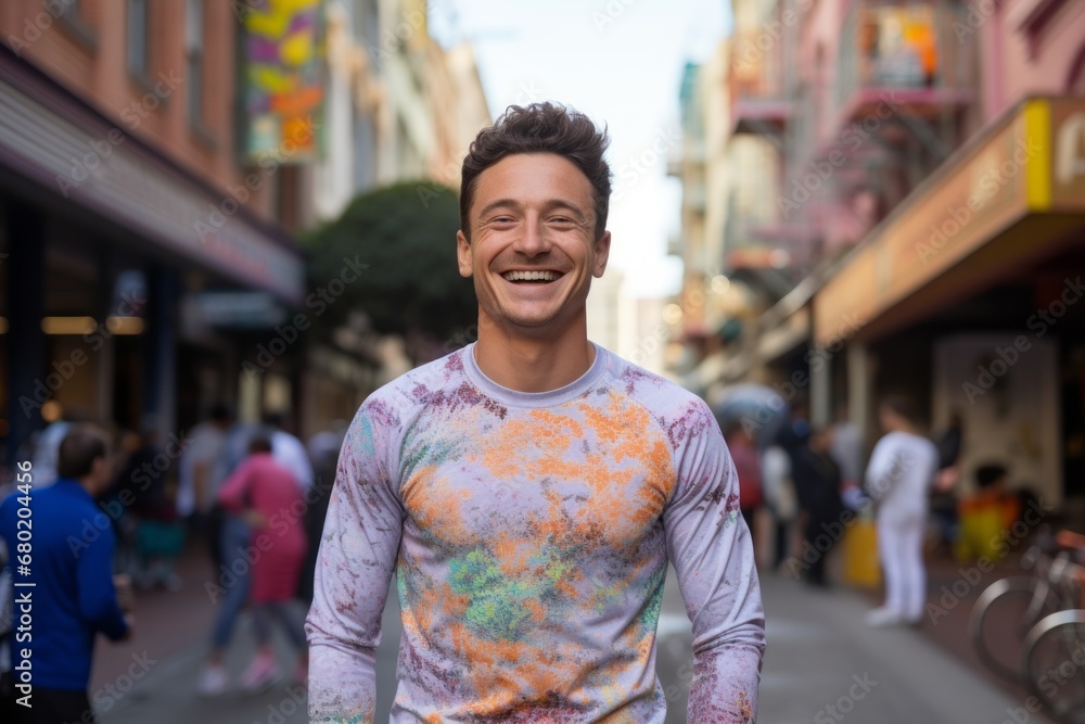 Portrait of a joyful man in his 20s showing off a lightweight base layer against a vibrant market street background. AI Generation Portrait of a joyful man in his 20s showing off a lightweight base layer against a vibrant market street background. AI Generation