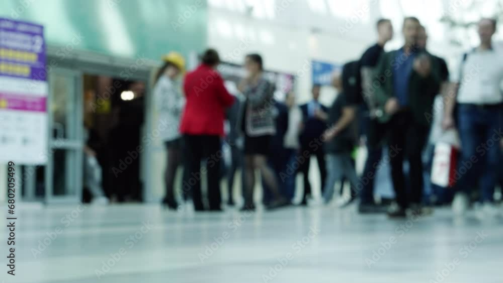 The movements of many business people passing through the business center. The movements of many business people passing through the business center.