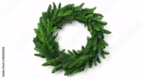 An isolated festive green wreath on a white background brightens the holiday season.