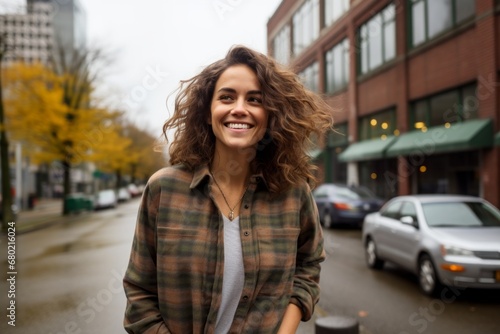 Portrait of a cheerful woman in her 30s wearing a comfy flannel shirt against a bustling city street background. AI Generation