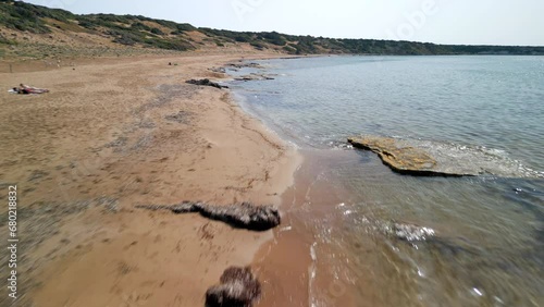 Wallpaper Mural Lara Beach, Cyprus: Cinematic low-height Drone View of Pristine Mediterranean Waters and Coastline with small motion blur Torontodigital.ca