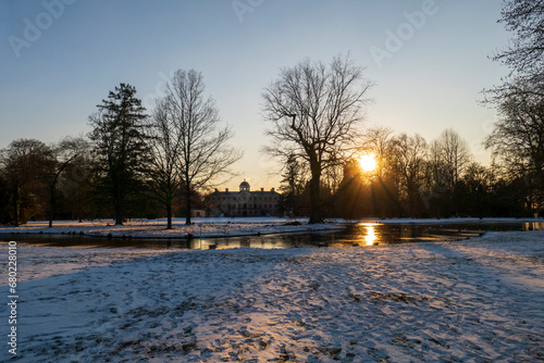 See am Schloss Favorite Foerch mit Schnee im Sonnenuntergang photo