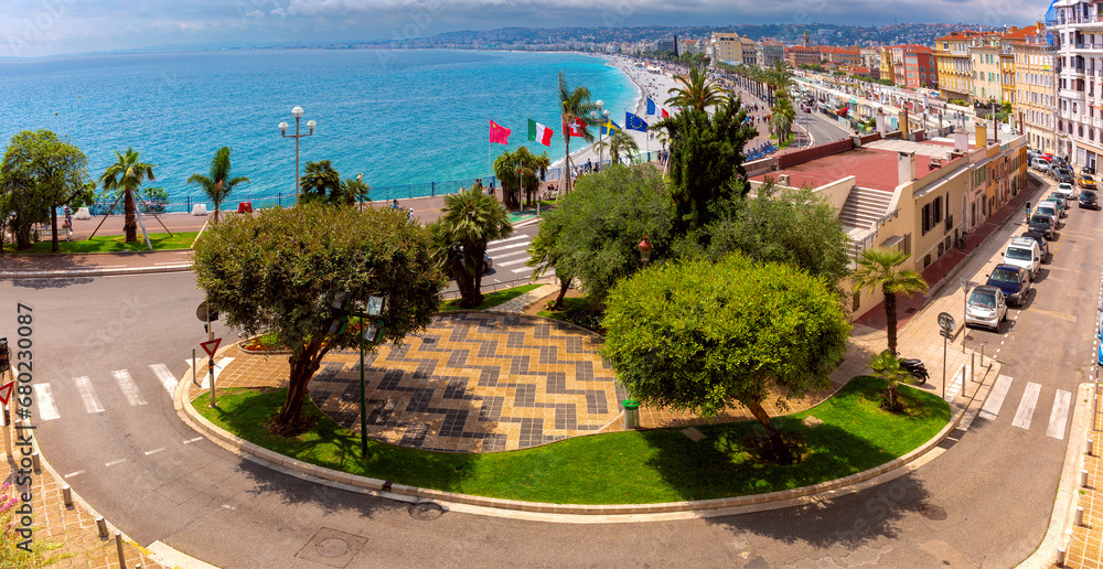 Aerial panoramic view of beach and Old town in sunny day, Nice, French Riviera, Cote d'Azur, France Aerial panoramic view of beach and Old town in sunny day, Nice, French Riviera, Cote d'Azur, France