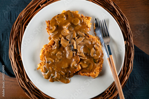 Fototapeta Naklejka Na Ścianę i Meble -  Sauerkraut pancakes /fuczka/ with mushroom sauce .