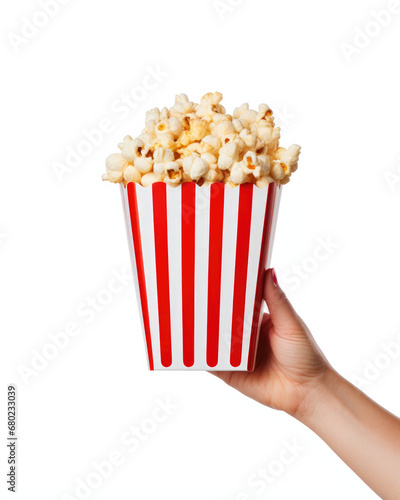 Hand Holding Red and White Striped Popcorn Container isolated on a white background, classic icon for template business presentation 