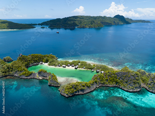 Fototapeta Naklejka Na Ścianę i Meble -  Idyllic Rufas Island, near Penemu in Raja Ampat, is surrounded by healthy corals and open ocean. This island, as well as those in the region, support some of the highest marine biodiversity on Earth.