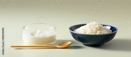 In Japan, the growth of technology has led to new ways of incorporating healthy and natural ingredients into food, as seen in the white rice cereal seasoned with organic Japanese spoonfuls of photo