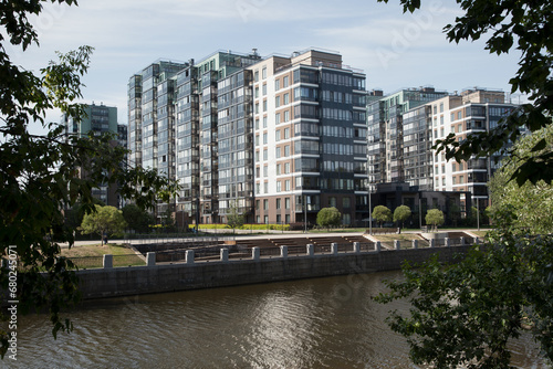 View of a modern modern residential complex by the lake