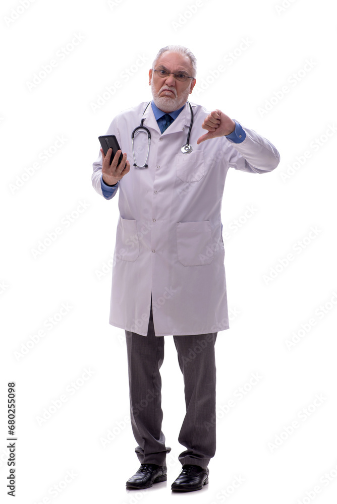 Old male doctor isolated on white Old male doctor isolated on white
