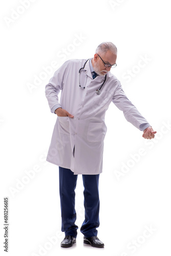 Old male doctor isolated on white