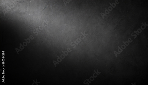 black texture background with fading light