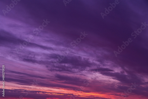 Beautiful sunrise, sunset violet purple orange sky with clouds abstract background texture
