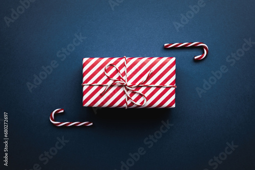 Christmas gift on color background, flat lay