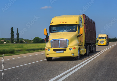 American trucks moves along a country road