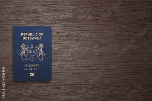 Botswana passport on wooden background, top view
