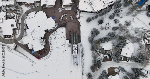 Aerial top down view of Vail, winter ski resort in Colorado. Charming snow covered town with narrow streets photo