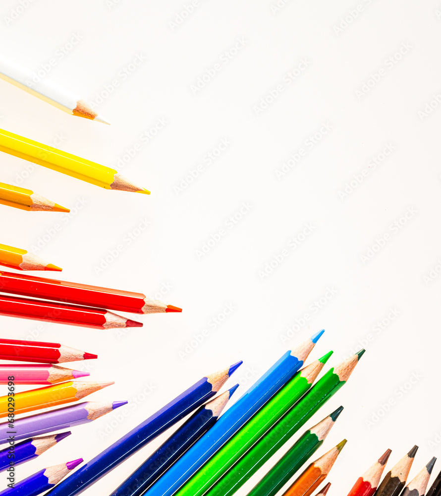 A Vibrant Array of Colorful Pencils in a Neat Row. A row of colored pencils sitting next to each other A Vibrant Array of Colorful Pencils in a Neat Row. A row of colored pencils sitting next to each other
