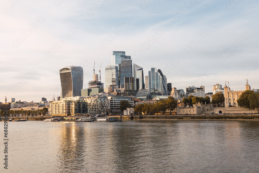 Sunrise over modern London cityscape and river Thames Sunrise over modern London cityscape and river Thames