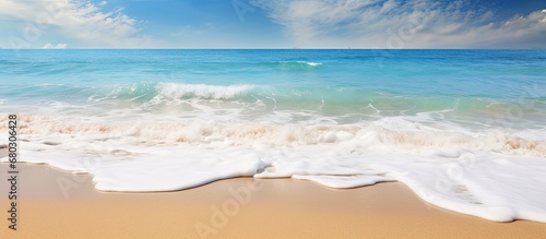 background of the white sandy beach, the texture of the colorful waves crashing against the shore creates a mesmerizing display, embodying the essence of a tropical summer vacation in nature by the