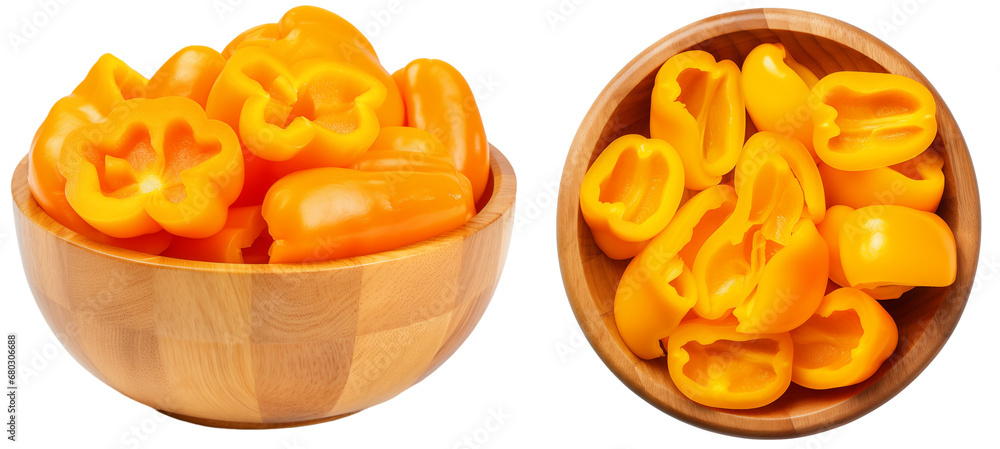 Orange bell pepper pieces in a wooden bowl isolated on a white background, vegetable bundle Orange bell pepper pieces in a wooden bowl isolated on a white background, vegetable bundle