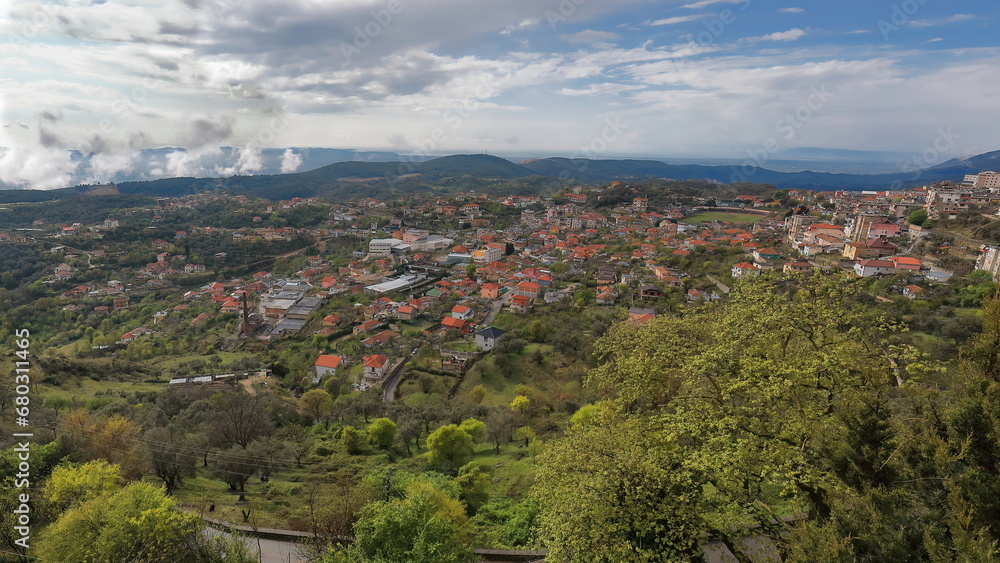 Partial panorama of the southern side of the town under a partly cloudy sky with wisps of fog. Kruje-Albania-050