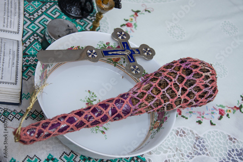 Fotografi basil  and cross used by priests to sanctify houses with aghiasma and objects in