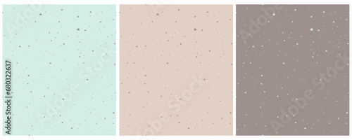 Tiny Stars Seamless Vector Patterns. Irregular Hand Drawn Simple Starry Print for Fabric, Wrapping Paper. Infantile Style Galaxy Design. Little Stars Isolated on a Mint Blue, Beige and Dusty Brown.RGB