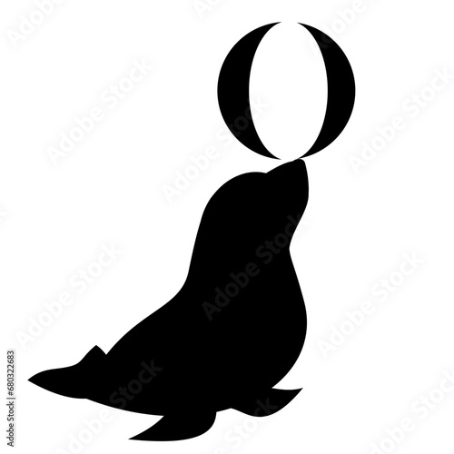 silhouette of seal with beach ball on nose
