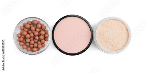 Different face powders isolated on white, top view