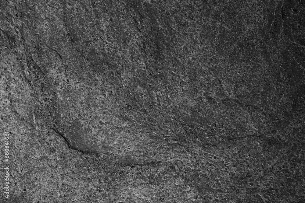Texture of dark grey stone surface as background, closeup Texture of dark grey stone surface as background, closeup